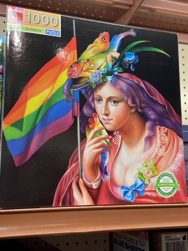 A puzzle Diana spotted in Santa Monica depicting a purple-haired Lady Liberty stroking her face with a rainbow fish