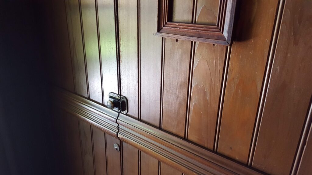 A secret door that looks like a wall inside the haunted Winchester Mystery House