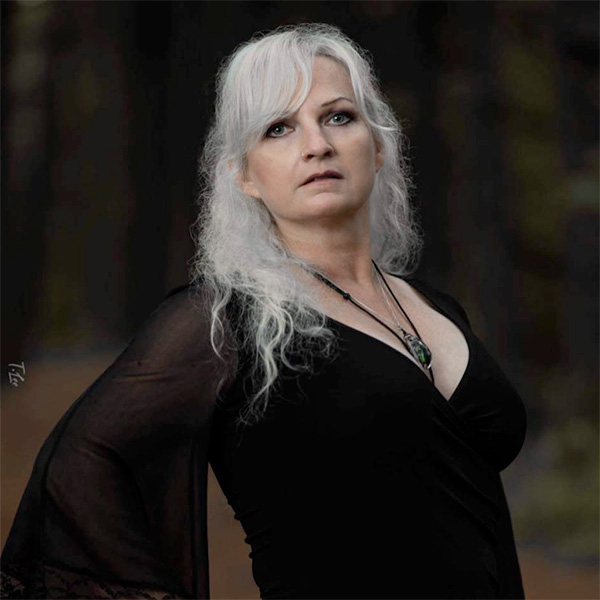 Ronda Caudill, PHD: author, publisher, medium, witch, and now, the owner of a haunted AirBNB