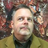 Author and antique store owner Duane Scott Cerny looking pensive