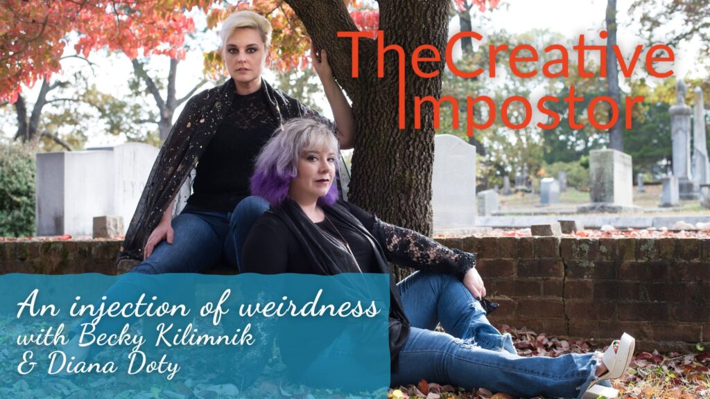 Becky and Diana, the Homespun Haints, sit under a tree in an Atlanta cemetery, as orange leaves swirl around their spooky, black-clad forms.