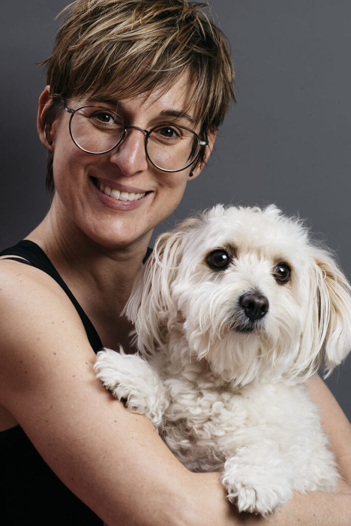 FrauBar founder Courtney Craig holding her adorable white chichon dog, tells us of her real telekinesis stories